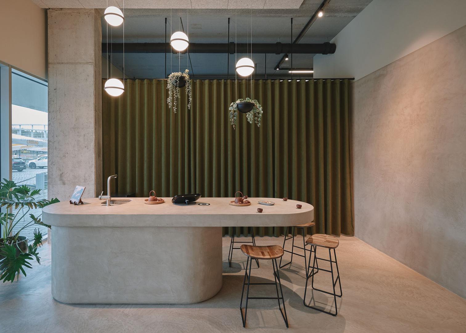 Studio Ôm Brussels interior, bathed in natural light along the canal